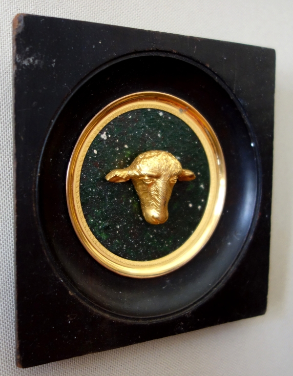 Miniature ormolu lamb head on a porphyry background, souvenir of the Grand tour