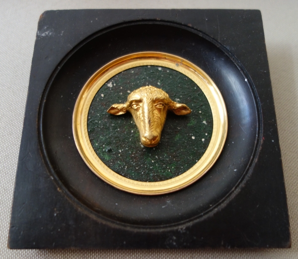 Miniature ormolu lamb head on a porphyry background, souvenir of the Grand tour