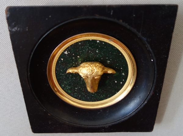 Miniature ormolu lamb head on a porphyry background, souvenir of the Grand tour