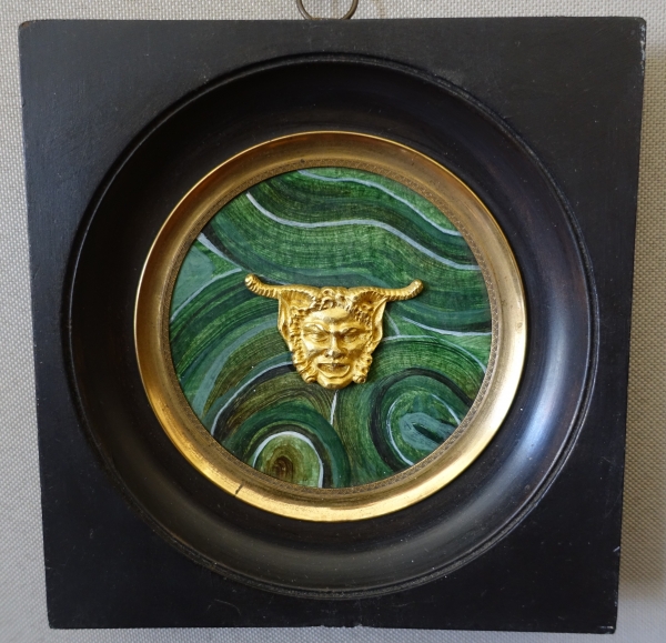 Ravrio : miniature ormolu satyr / faun mask on a malachite background, 19th century