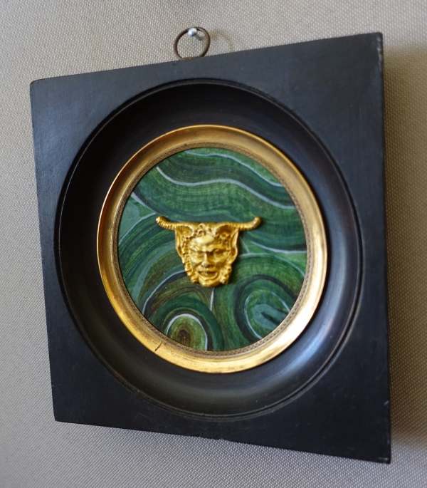 Ravrio : miniature ormolu satyr / faun mask on a malachite background, 19th century