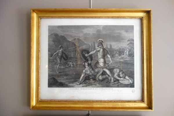 Pair of Empire engravings, gold leaf gilt wood frame, early 19th century circa 1820