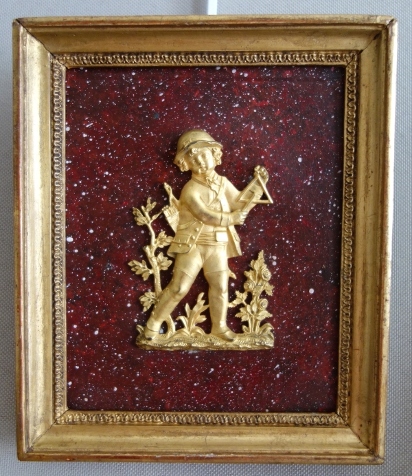 Paire de médaillons miniatures en bronze doré au mercure, fond faux porphyre - début XIXe siècle