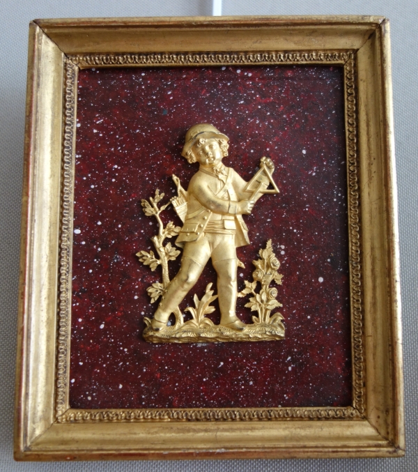 Paire de médaillons miniatures en bronze doré au mercure, fond faux porphyre - début XIXe siècle