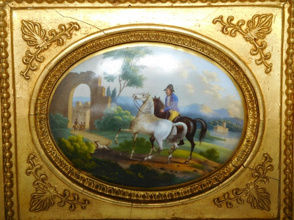 Paire de peintures sur porcelaine, l'éleveur de chevaux, cadres en bois doré époque Empire