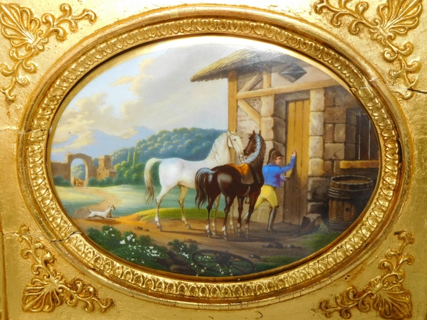 Paire de peintures sur porcelaine, l'éleveur de chevaux, cadres en bois doré époque Empire