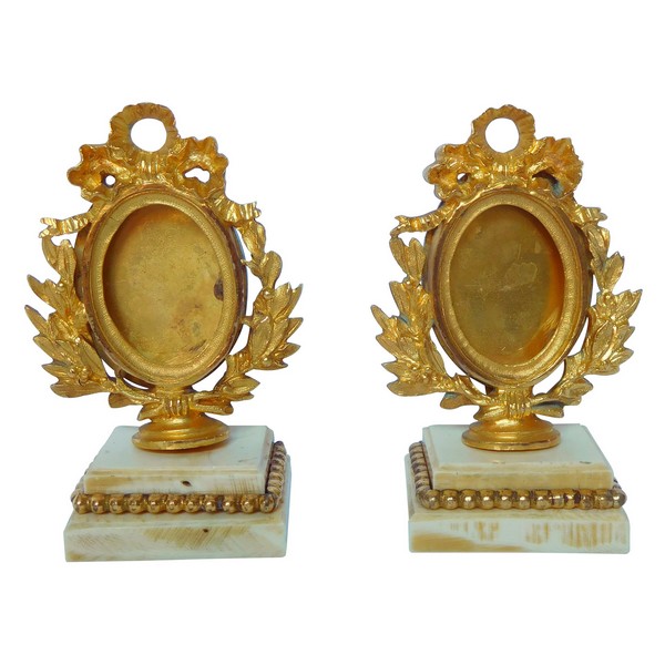 Pair of ormolu and ivory miniature frames - Louis XVI style, mid 19th century
