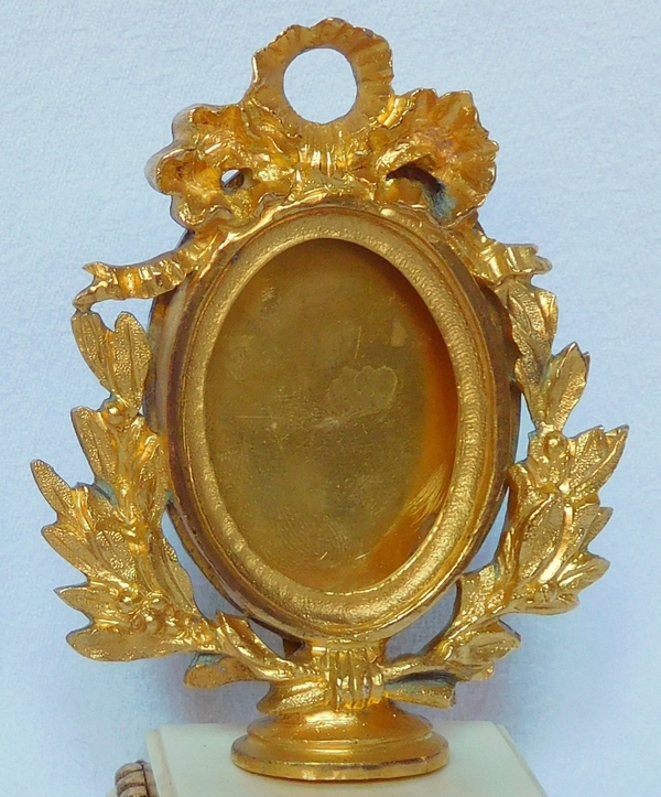 Pair of ormolu and ivory miniature frames - Louis XVI style, mid 19th century