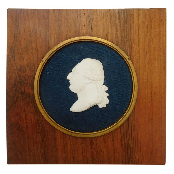 Louis XVI miniature biscuit bust in a rosewood frame, 19th century