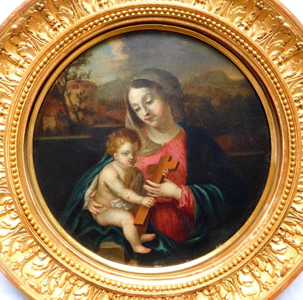 17th or 18th century school : Virgin and Child, oil on panel set into a circular gilt wood frame