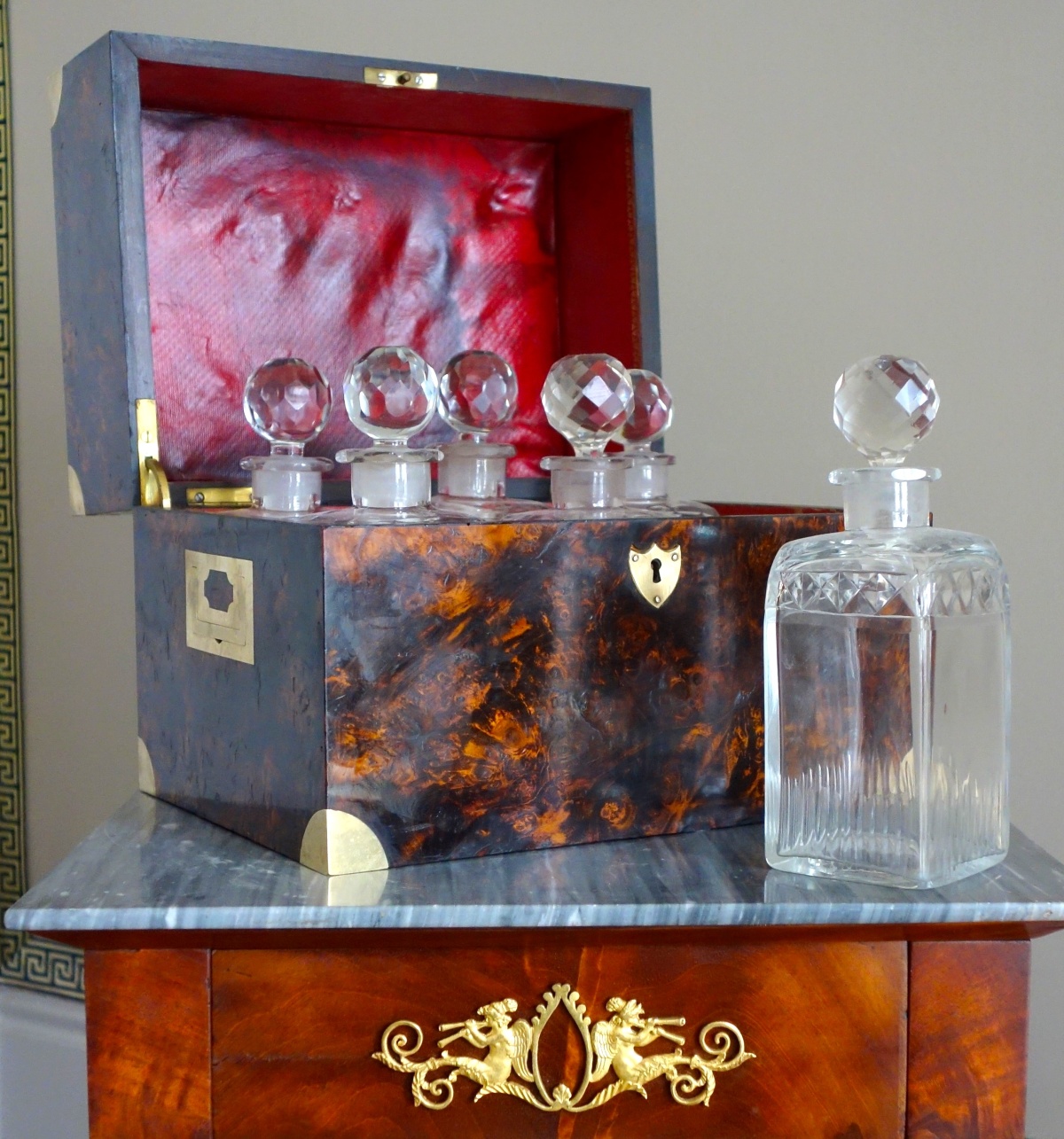 Detail — Burr wallnut and Le Creusot crystal liquor set, Empire period, early 19th century