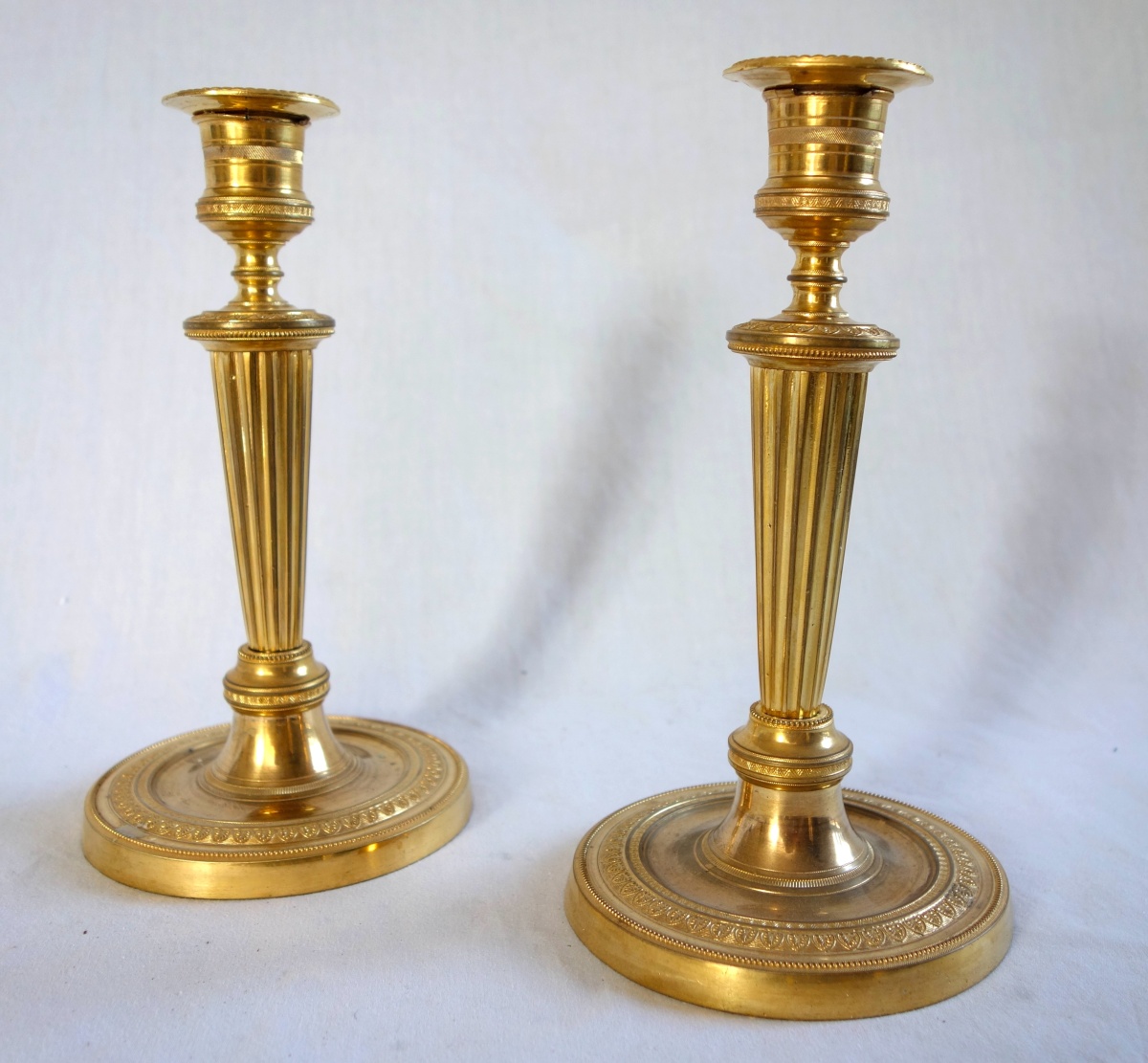 Detail — Pair of Louis XVI style ormolu candlesticks, Empire period circa 1800 - 19cm