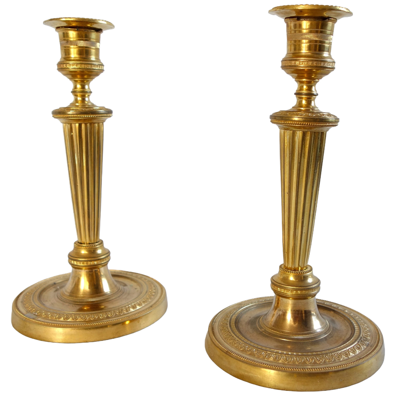Pair of Louis XVI style ormolu candlesticks, Empire period circa 1800 - 19cm