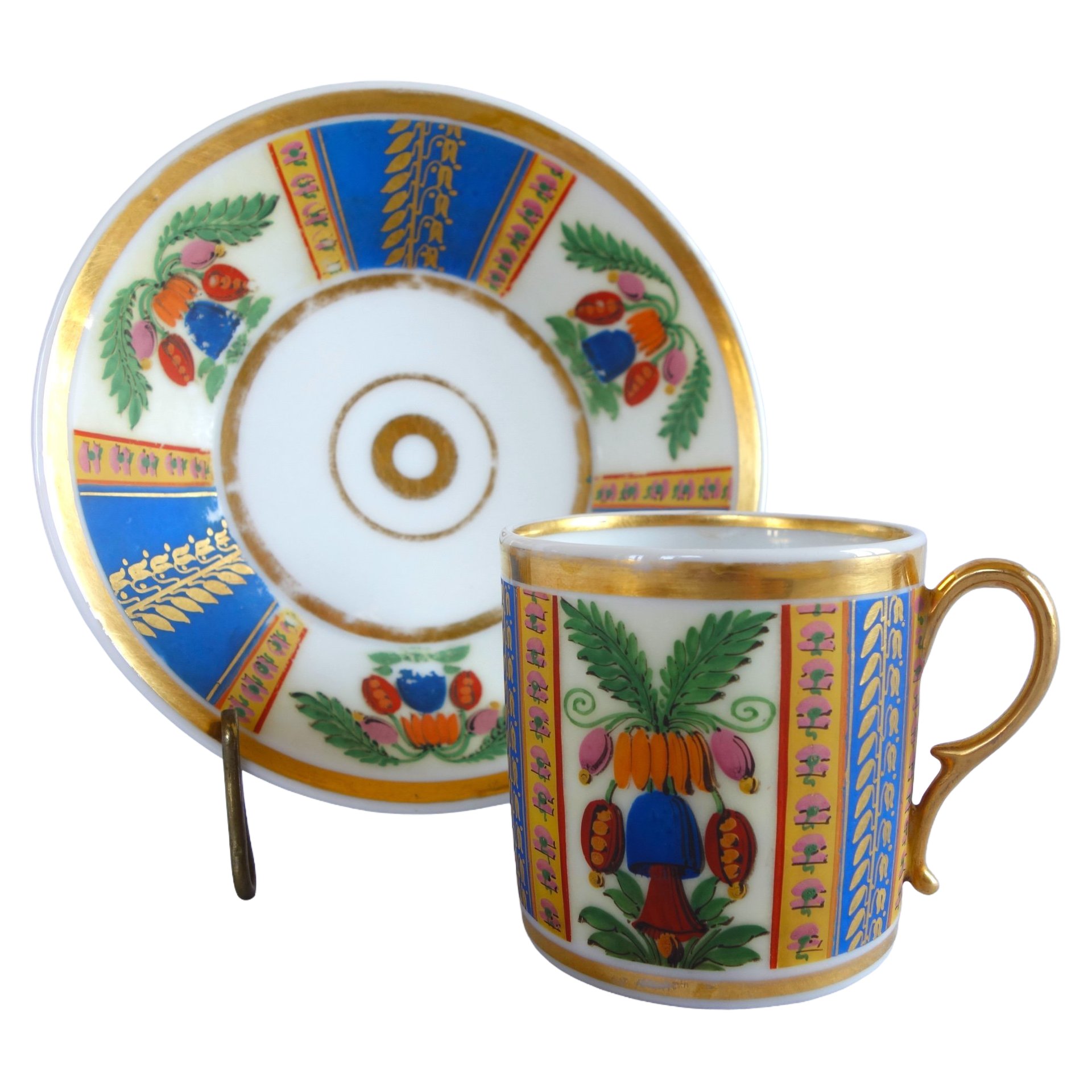 Empire gilt Paris porcelain and polychromatic biscuit coffee cup, early 19th century