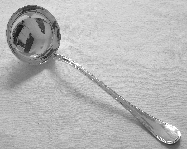 Detail — Christofle silver-plated ladle, Perles pattern