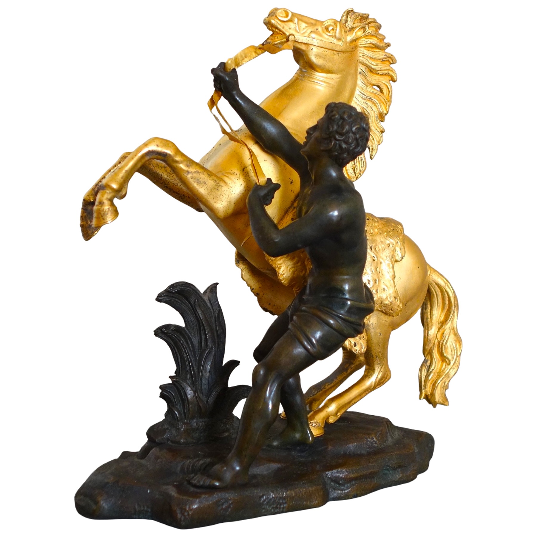 An ormolu and patinated bronze Marly Horse after Coustou - early 19th century