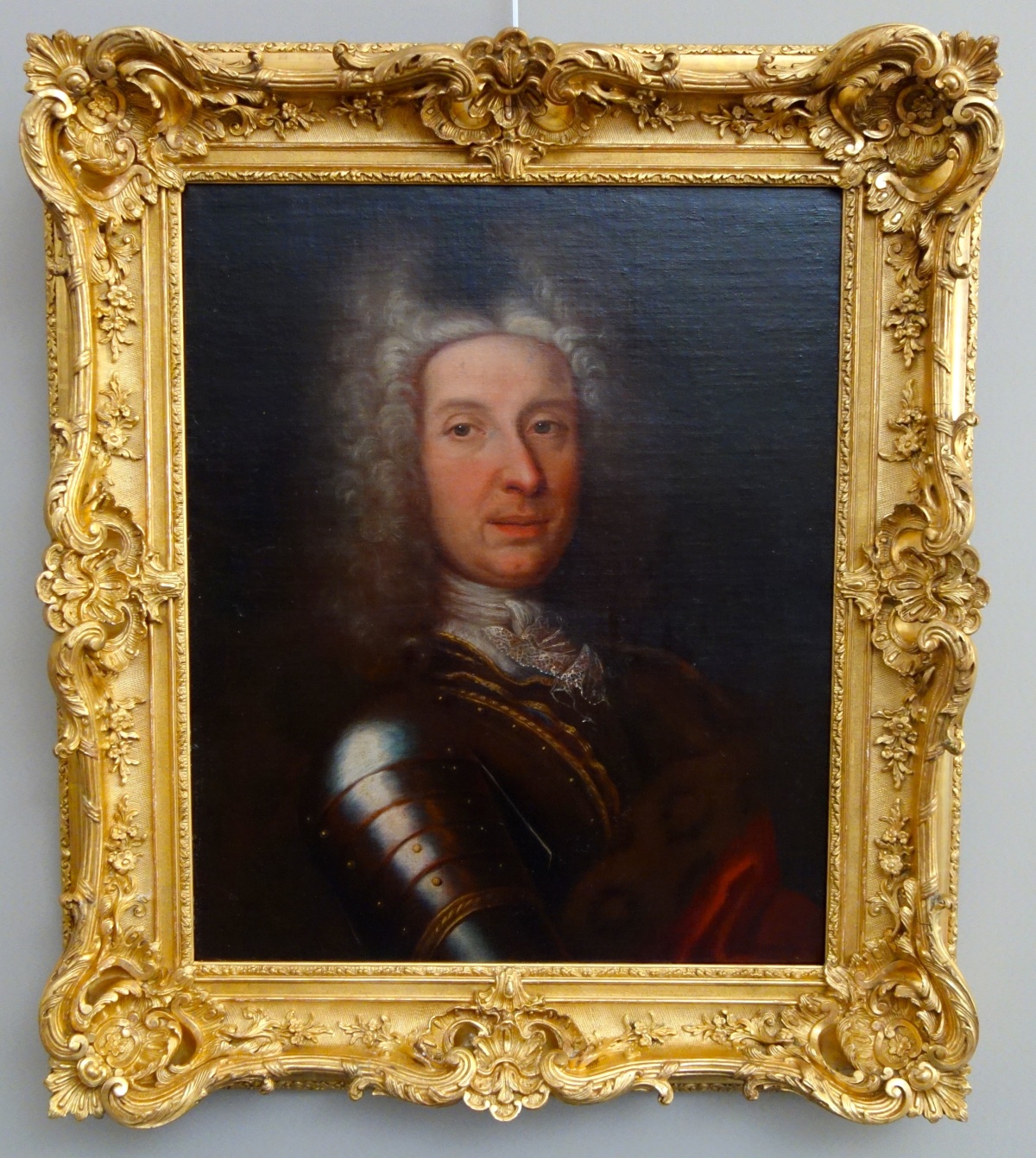 Detail — Early 18th century French school, portrait of an officer circa 1730