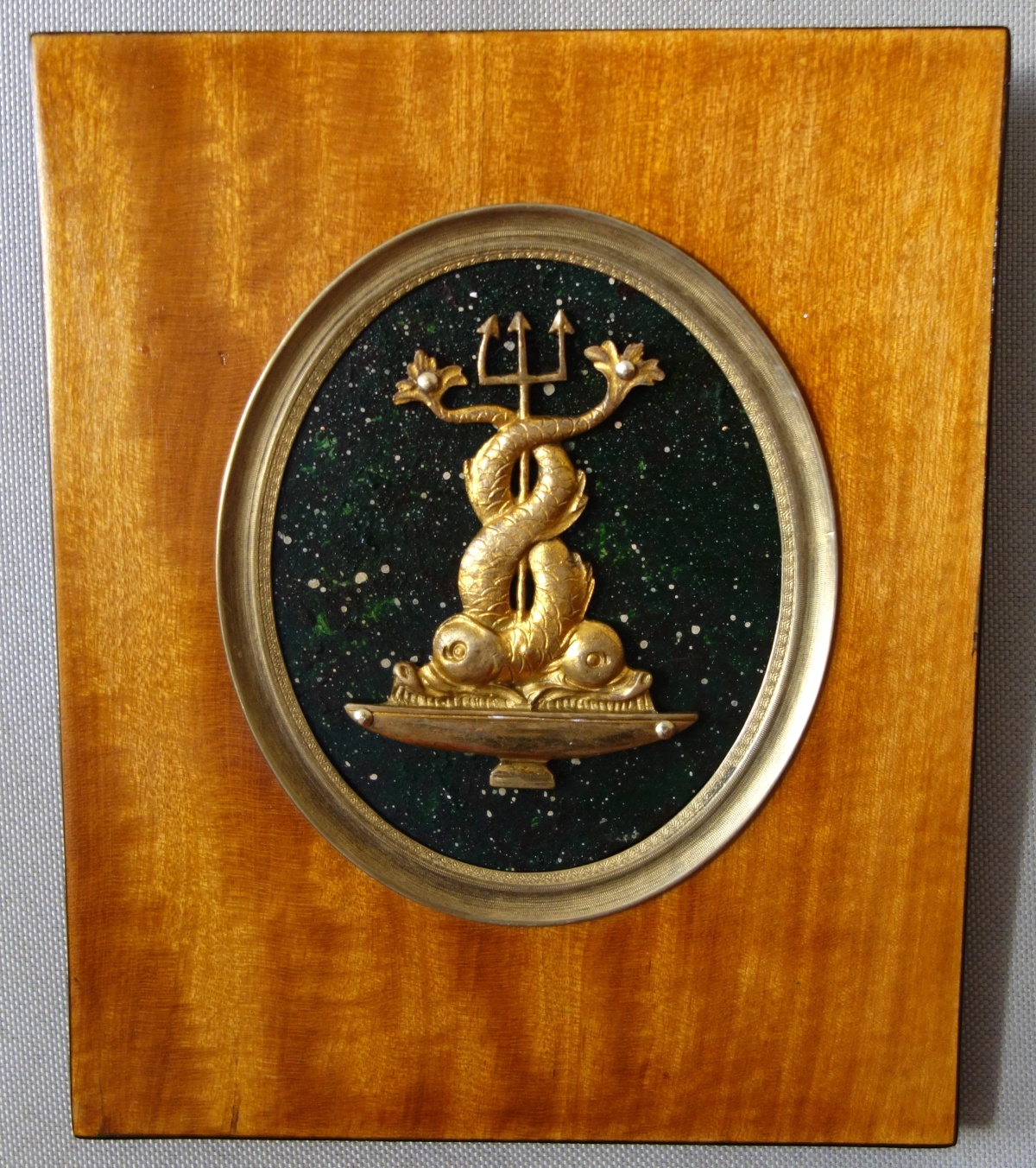 Detail — Ormolu dolphins set into a lemon tree frame, porphyry background in trompe l'oeil style
