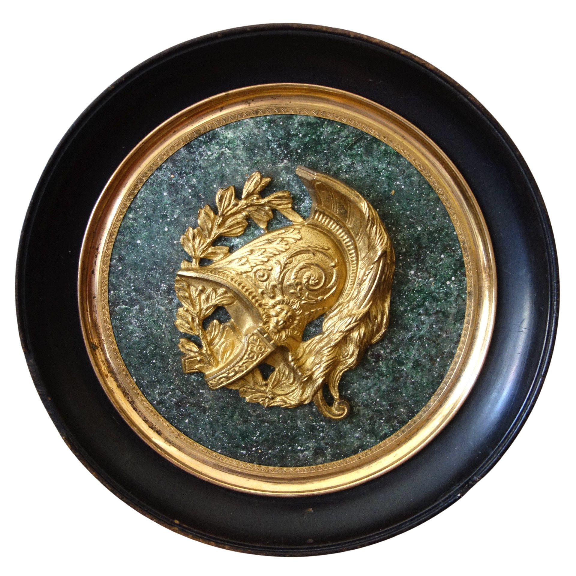 Large miniature, gilt bronze military trophee / antique style helmet on a porphyry background